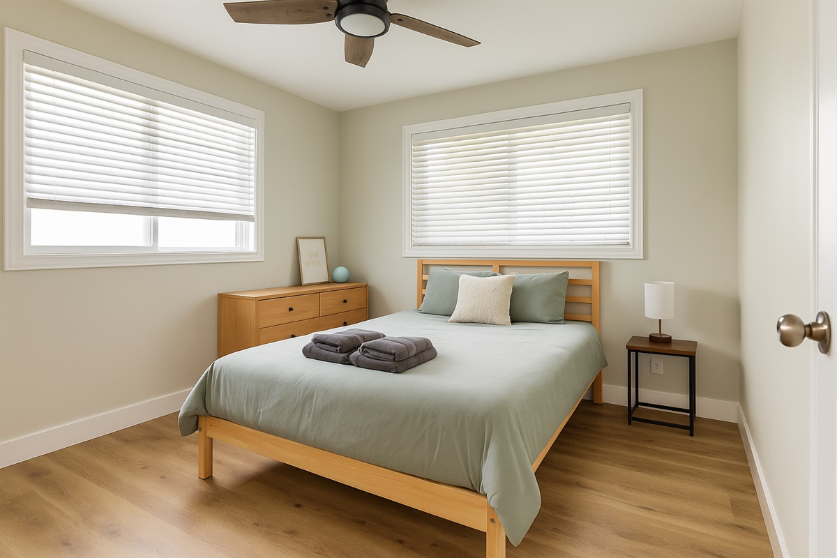 Queen Bedroom 1 | Representative Interior. Finishes and decor vary by Unit