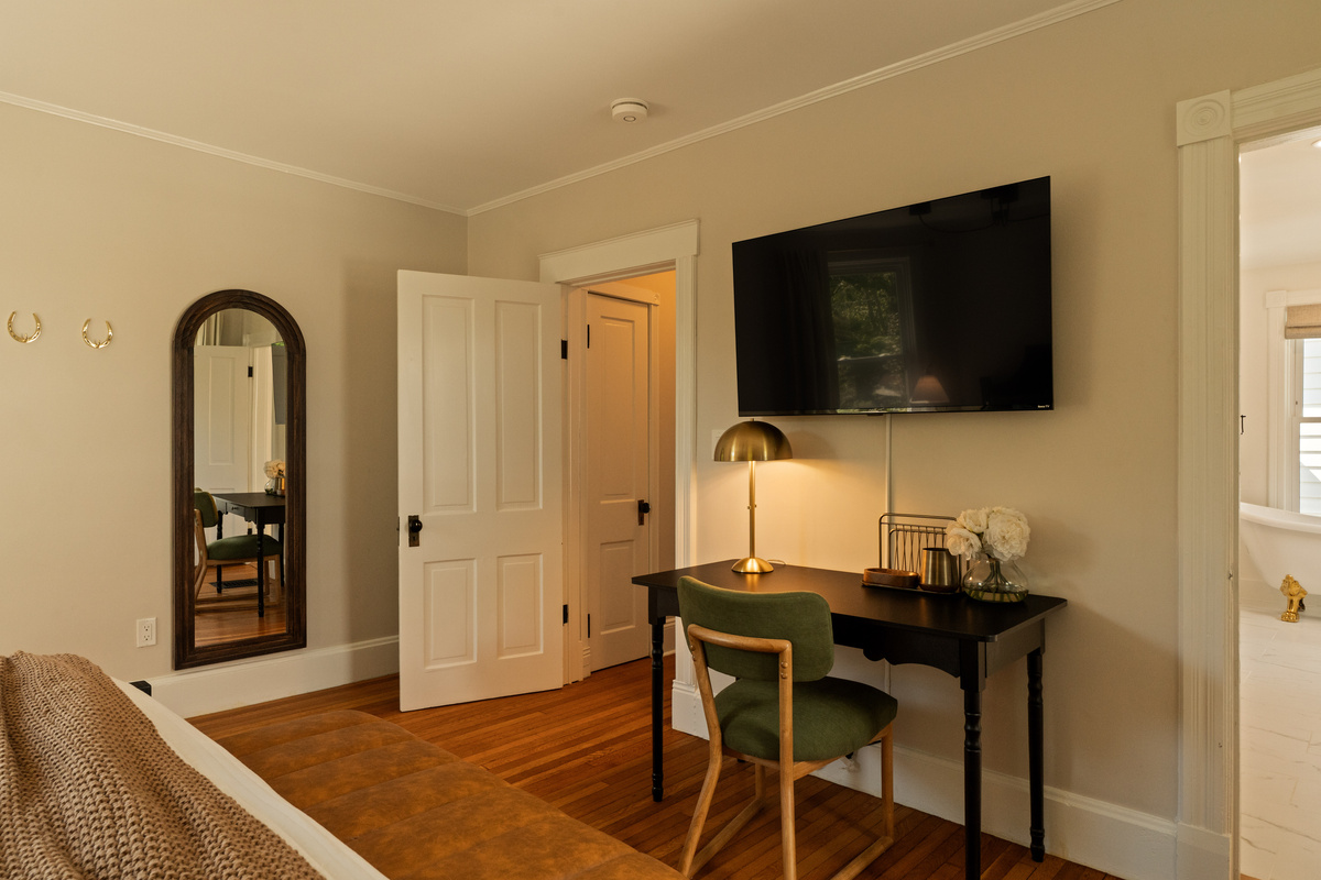 A quiet place to work when you need it. The primary bedroom includes a dedicated desk and workspace, perfect for catching up on emails or working remotely during your stay.