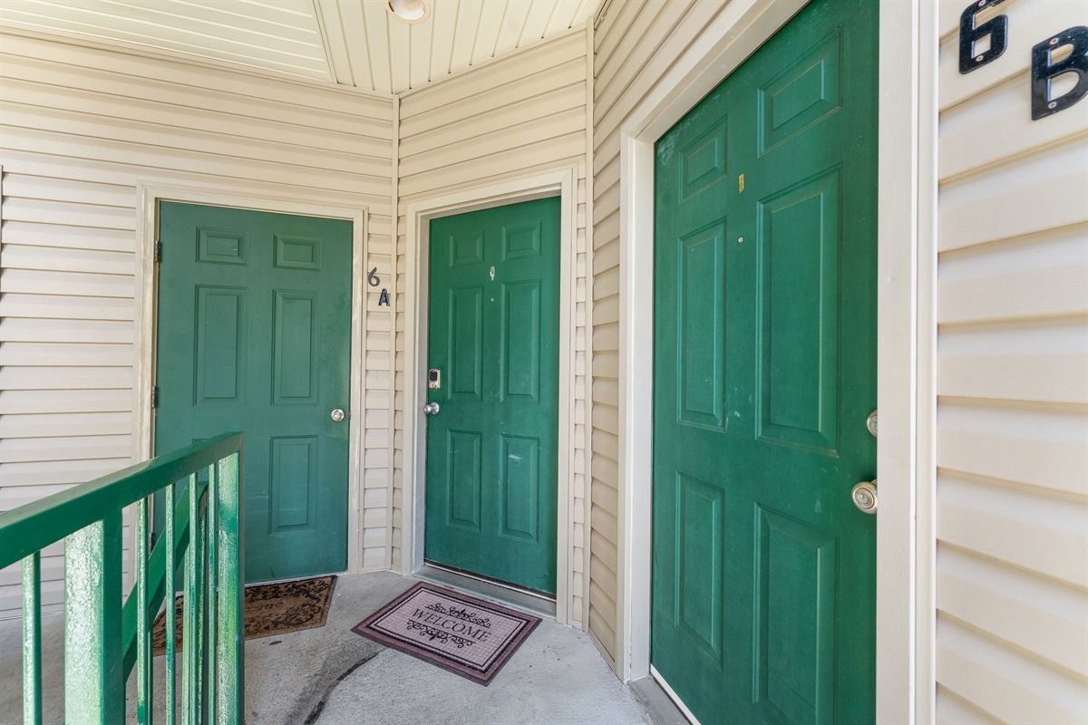 Covered walk-in building access makes arrival and unloading easier—no stairs required to reach the condo.