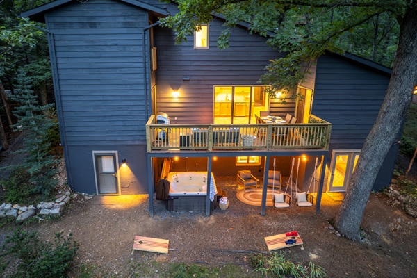Two levels of outdoor fun with a deck on the main level, and a hot tub on the lower level. 