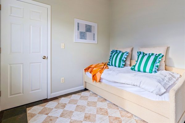A cozy and inviting space, the second bedroom offers the perfect spot to rest and recharge!