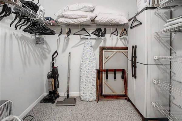 Walk-in Closet storage for clothes and extra luggage