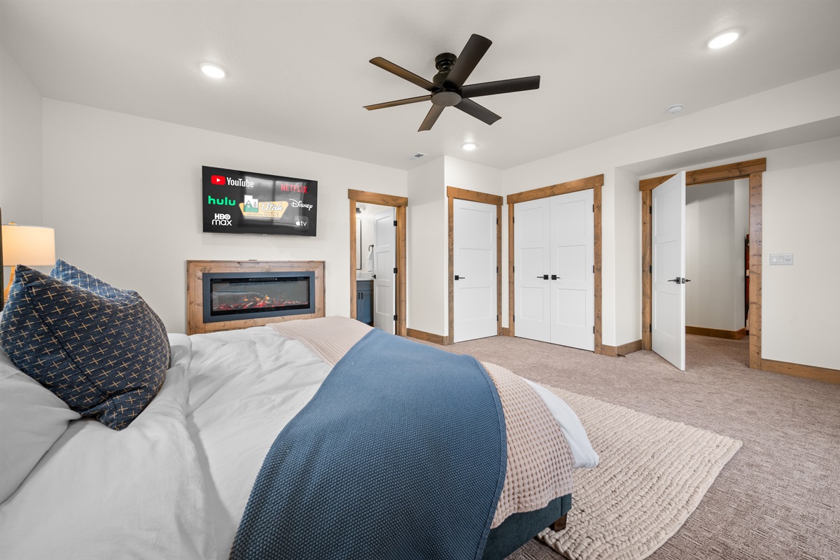 Bright and inviting bedroom with modern finishes, soft linens, and peaceful ambiance—ideal for unwinding in comfort.