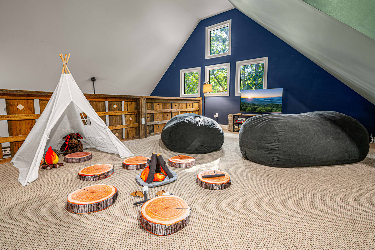 Little adventurers will love the indoor campfire and cozy teepee hideaway.
