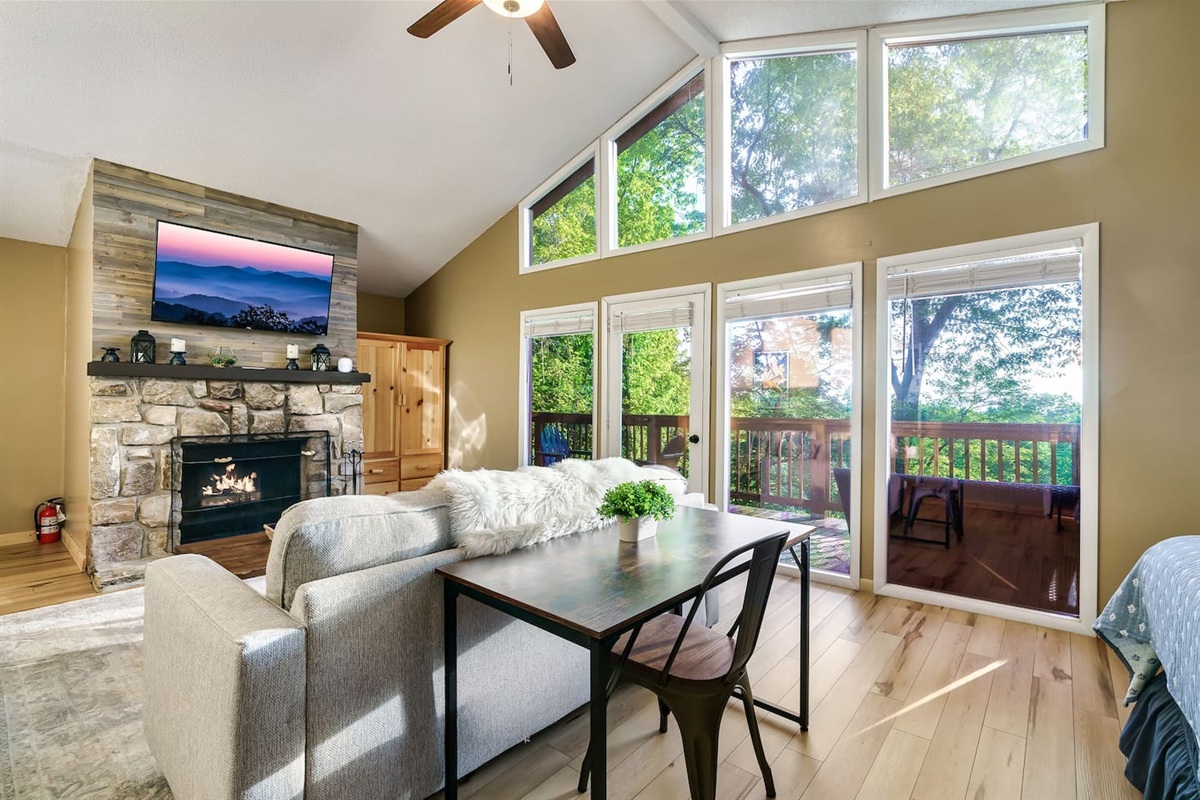 The spacious master bedroom suite has an attached bathroom, and its own living area and porch.