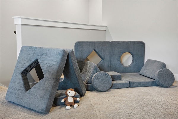 We welcome families—fort-ready pillows and thoughtful touches for little ones.