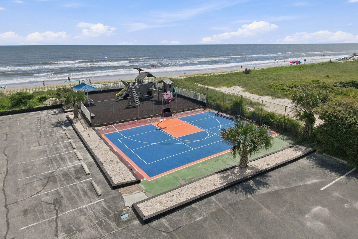 Active coastal living with on-site recreational courts and full ocean views.