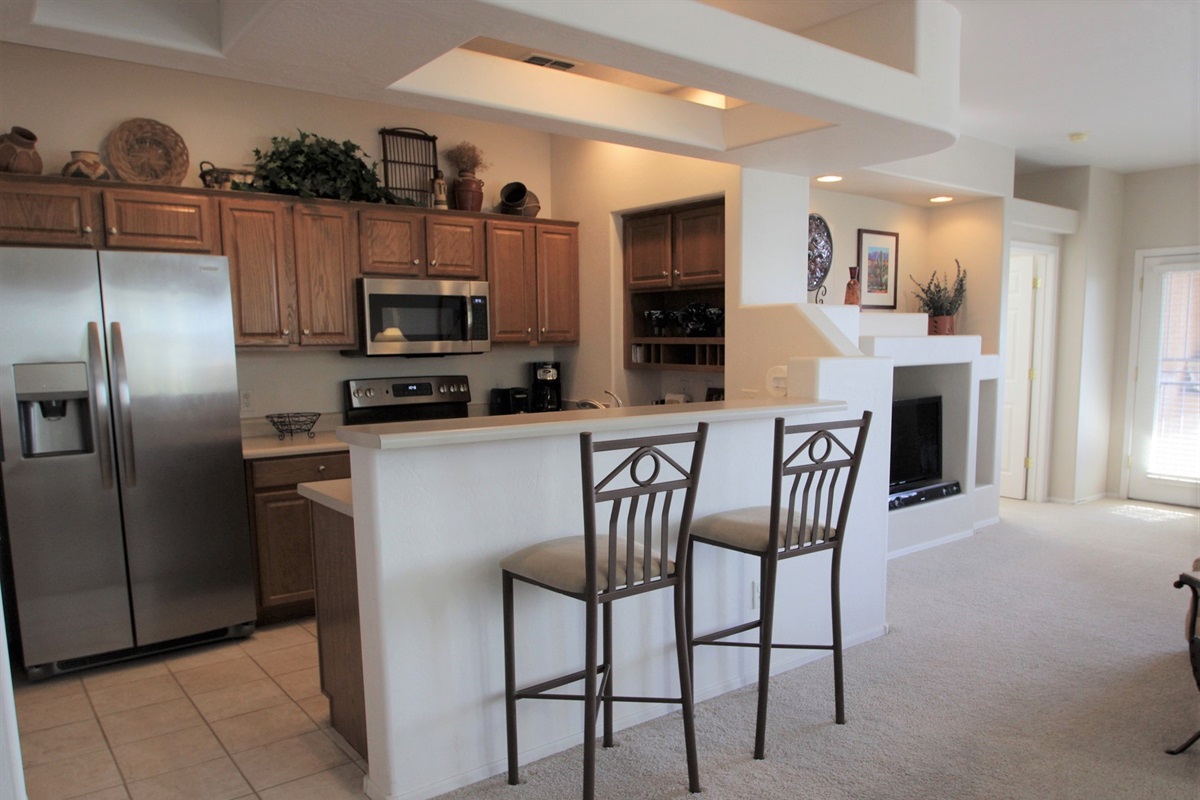 Kitchen offers bar top seating