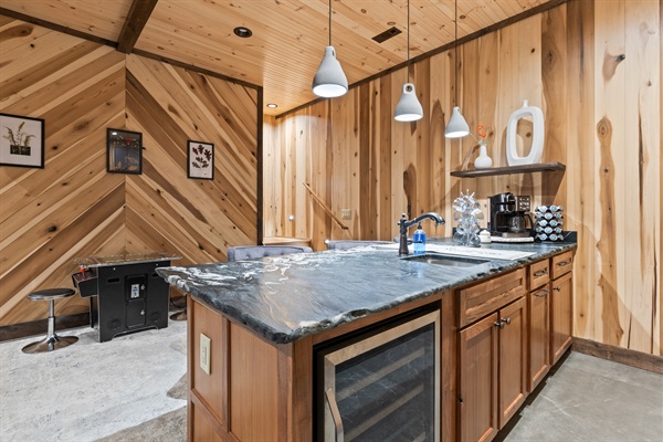 This cozy kitchenette and bar area offers a great spot for snacks, drinks, or light meals.