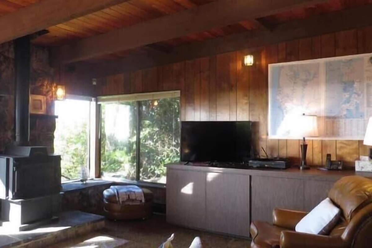 Living Room with wood stove & Tv