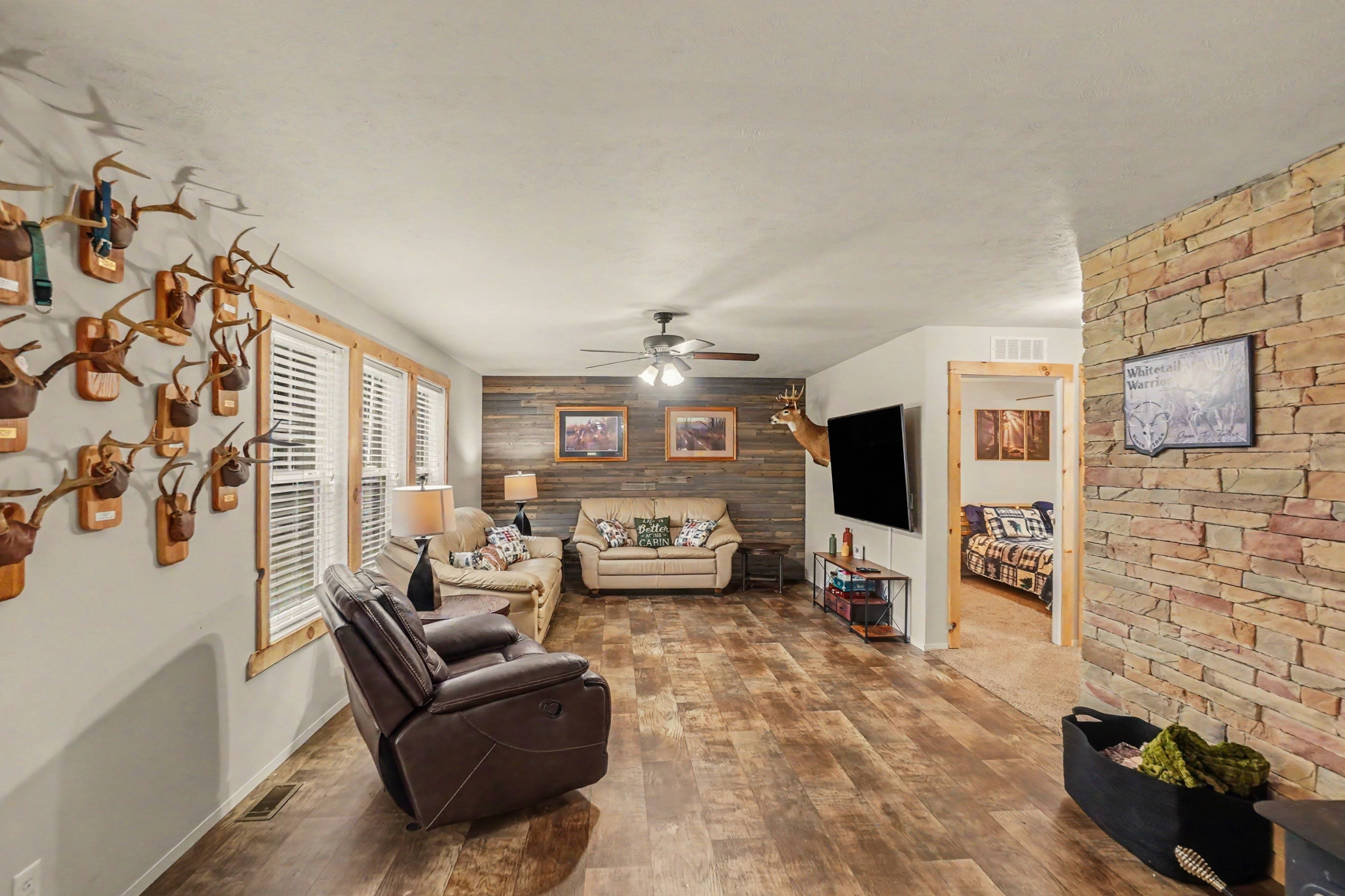 Living room with large smart TV.
