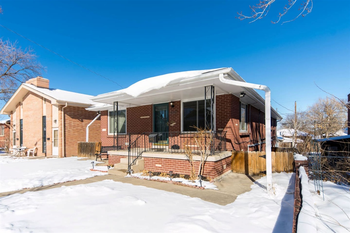 Private entrance to unit is through the side gate by porch and down staircase