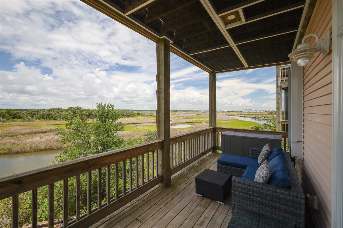 Relax on the roomy deck with beautiful sound views