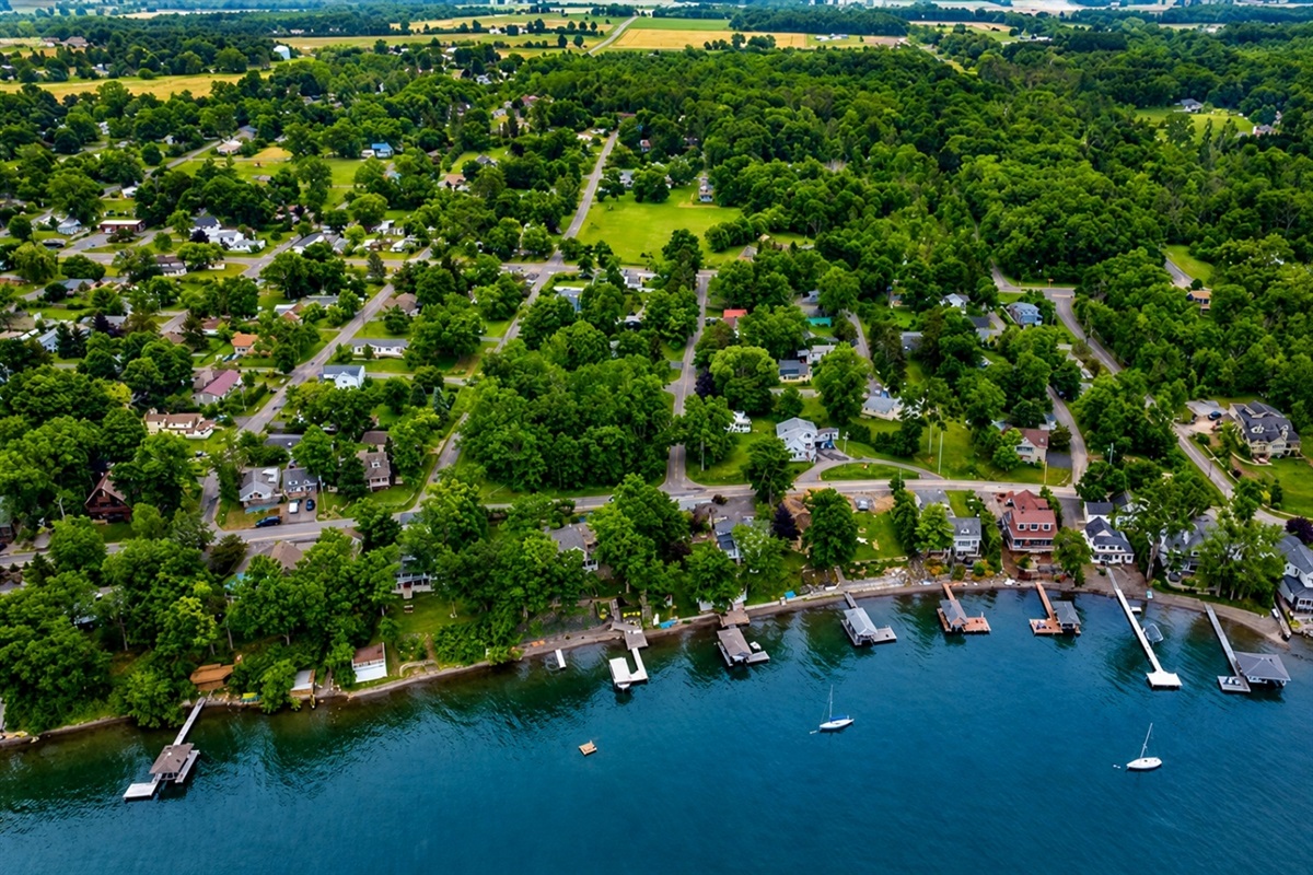 Lakefront paradise with private docks and tree-lined streets—this vibrant community combines waterfront recreation with classic Finger Lakes charm. A dream location for vacationers and locals alike.