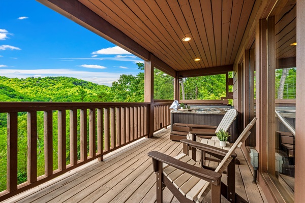 Relax in the hot tub with panoramic mountain views right from the main-level deck.