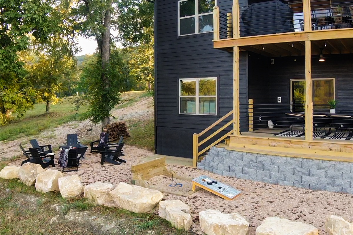 View of the firepit and outdoor games