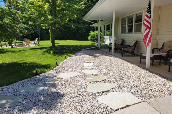 Walkway and covered seating to enjoy morning coffee