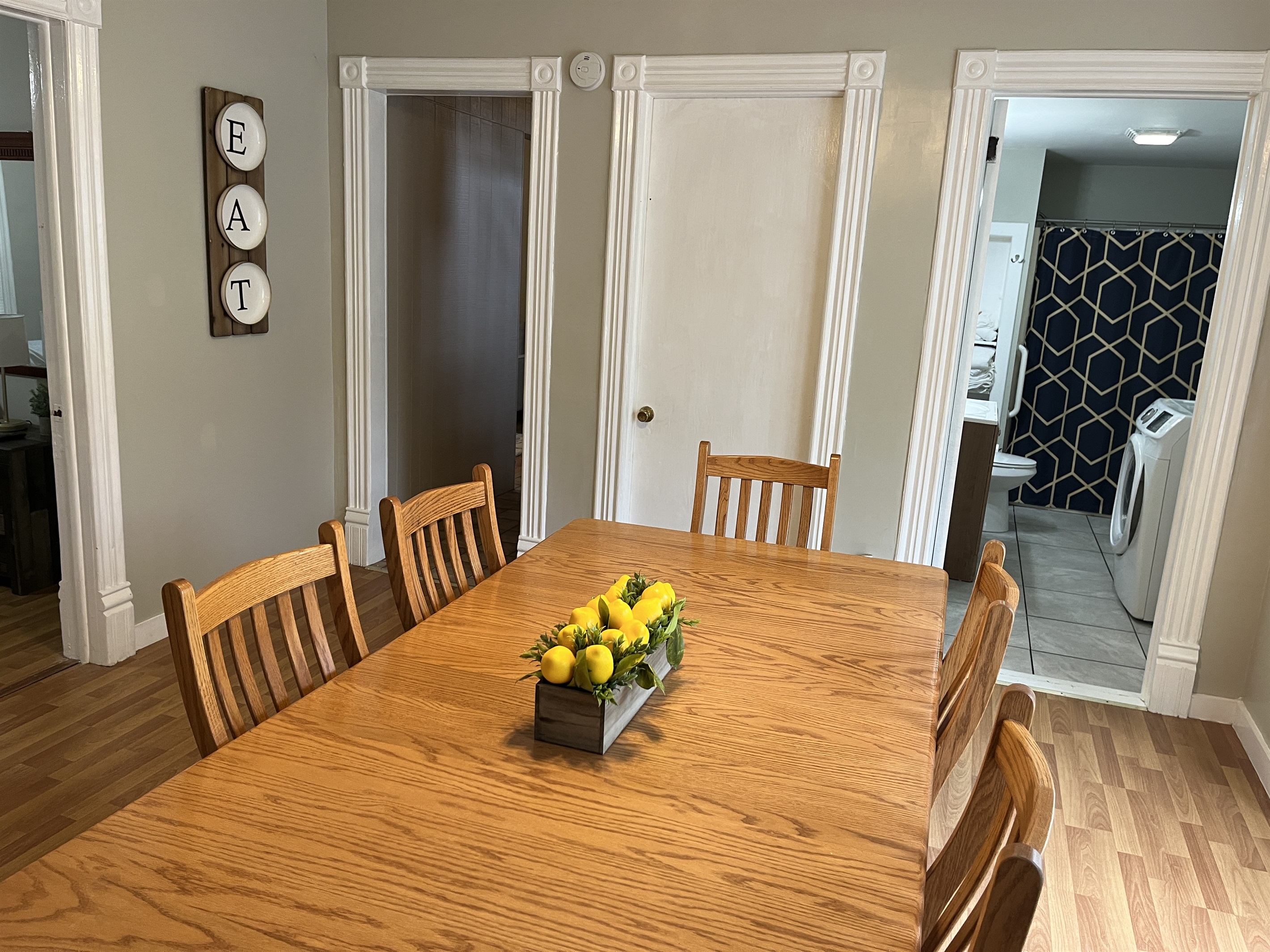 Dining room with bathroom/laundry beyond