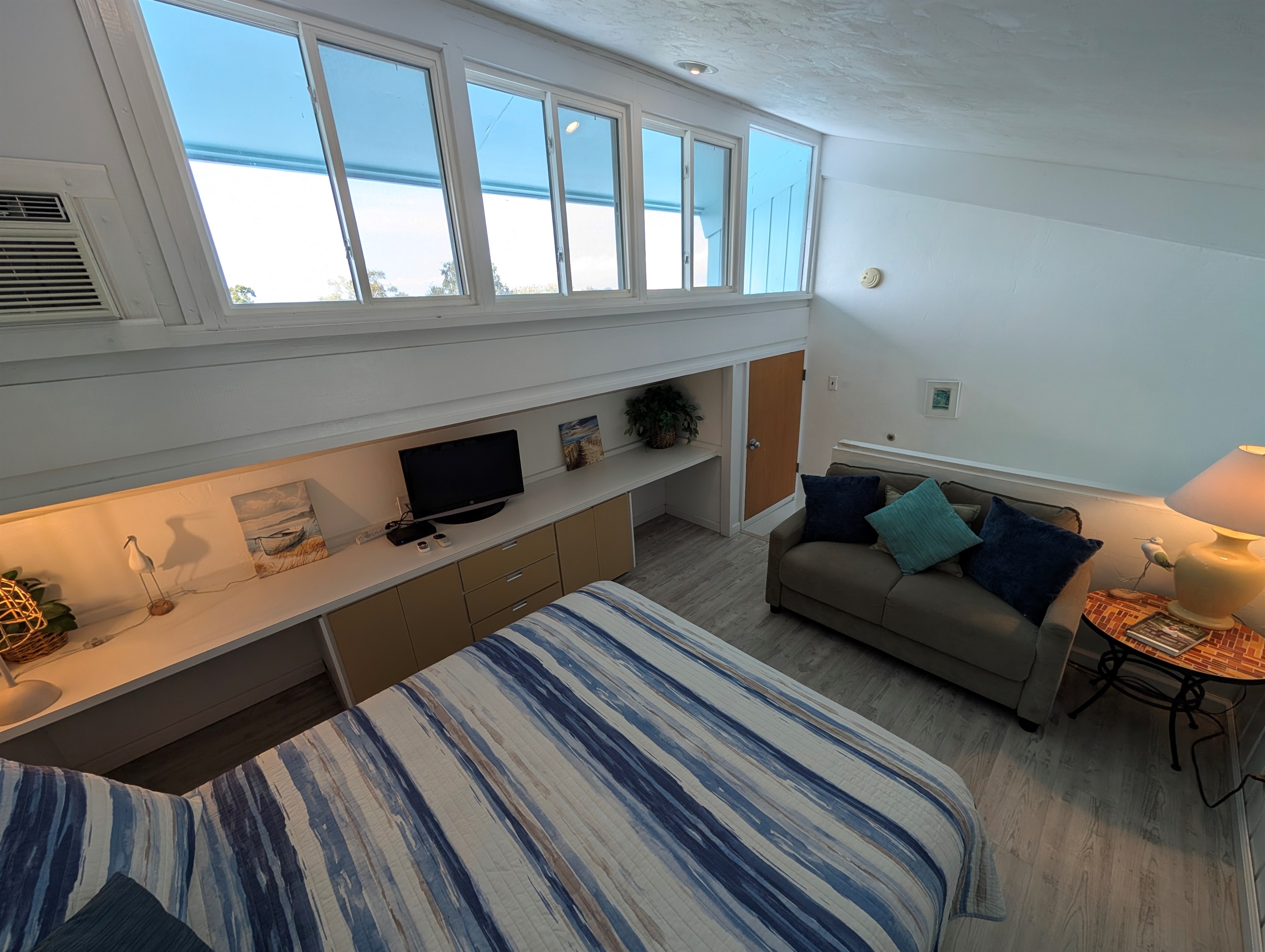 Loft with queen bed and sofa