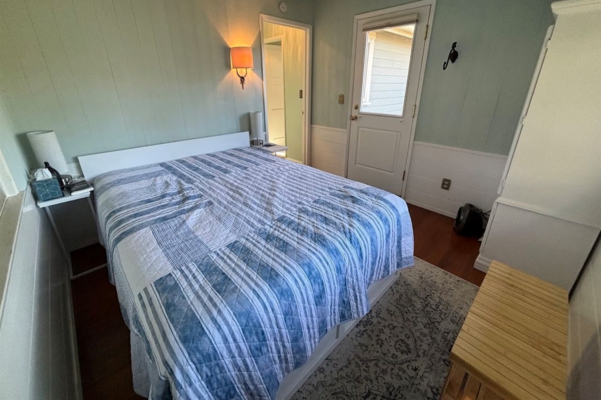 Back bedroom.  Door on right leads to back deck.