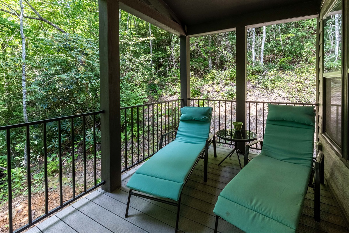 Step outside the bedroom to a private porch made for slow mornings and quiet lounging.