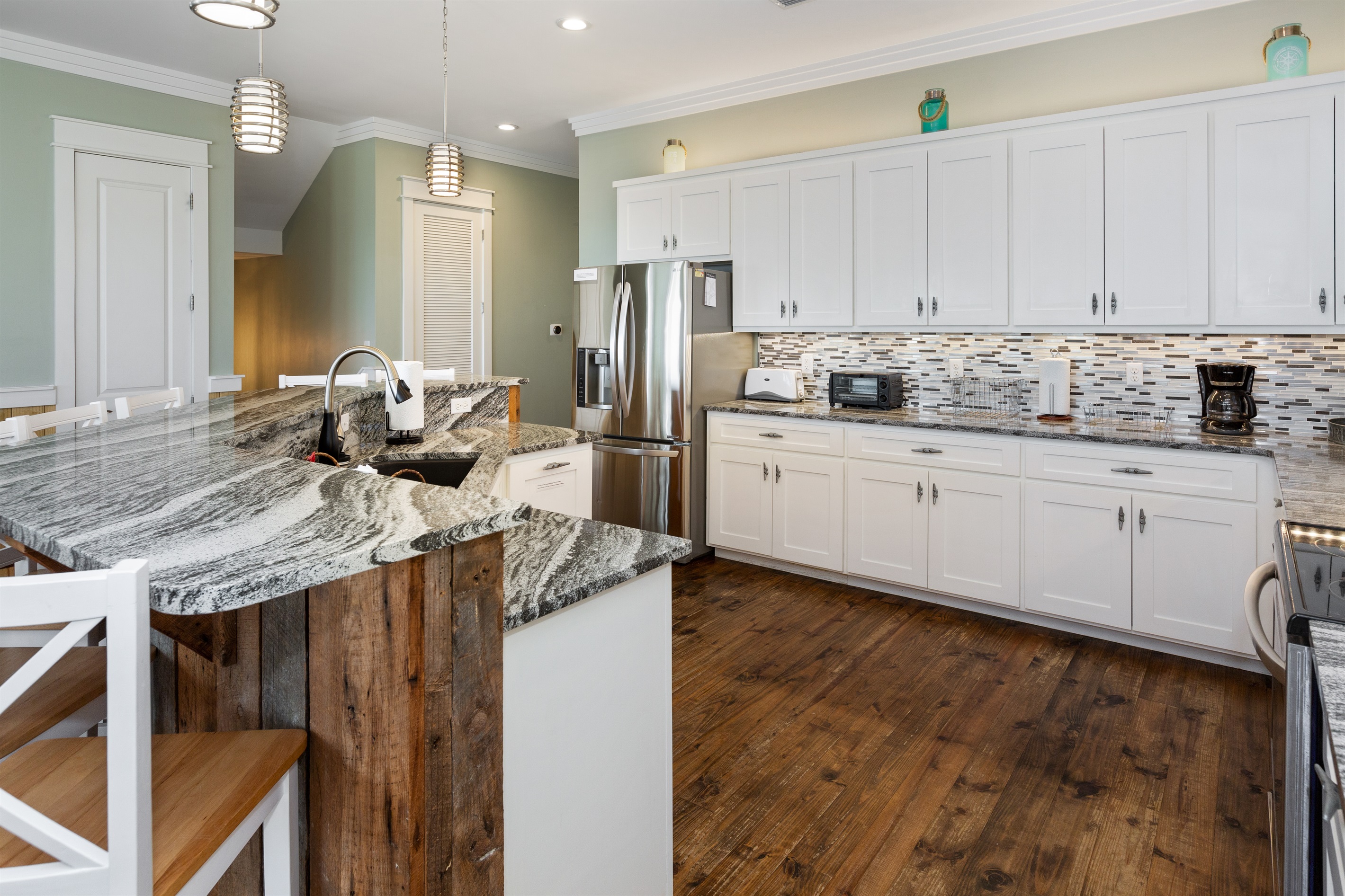 One of two user-friendly kitchens in this hEveryone gets to help cook and clean up with a kitchen this size!