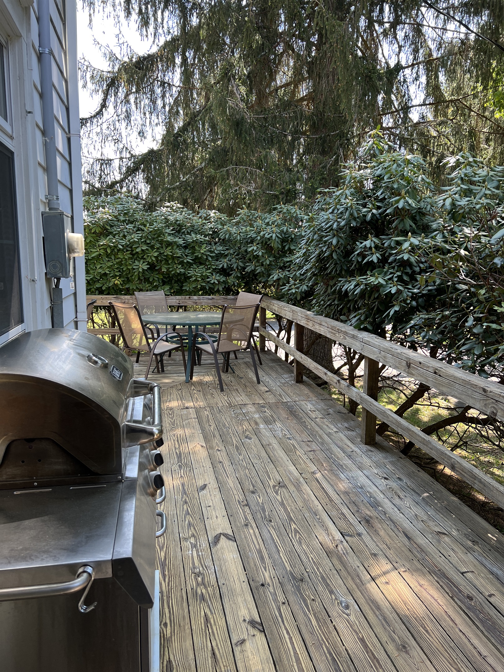 Wrap around deck with grill and easy access to the kitchen.