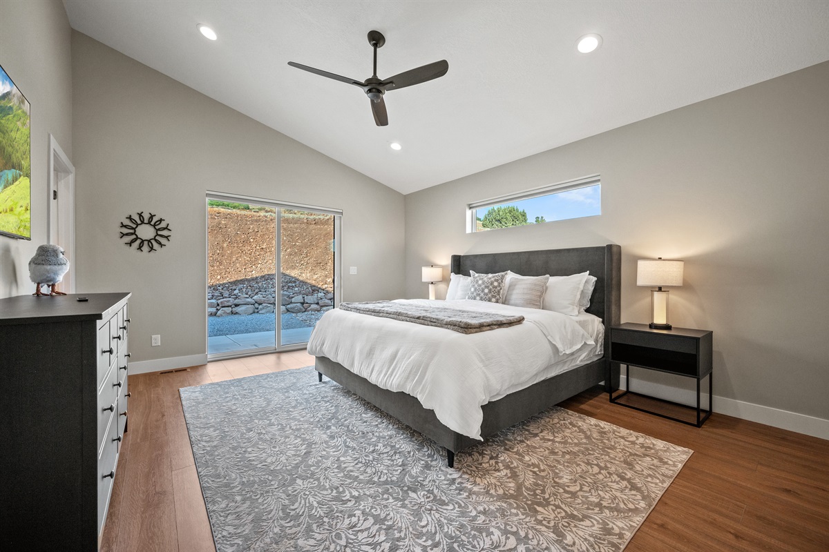 Patio doors offer direct access to fresh air, coffee at sunrise, or a relaxing evening dip in the hot tub.