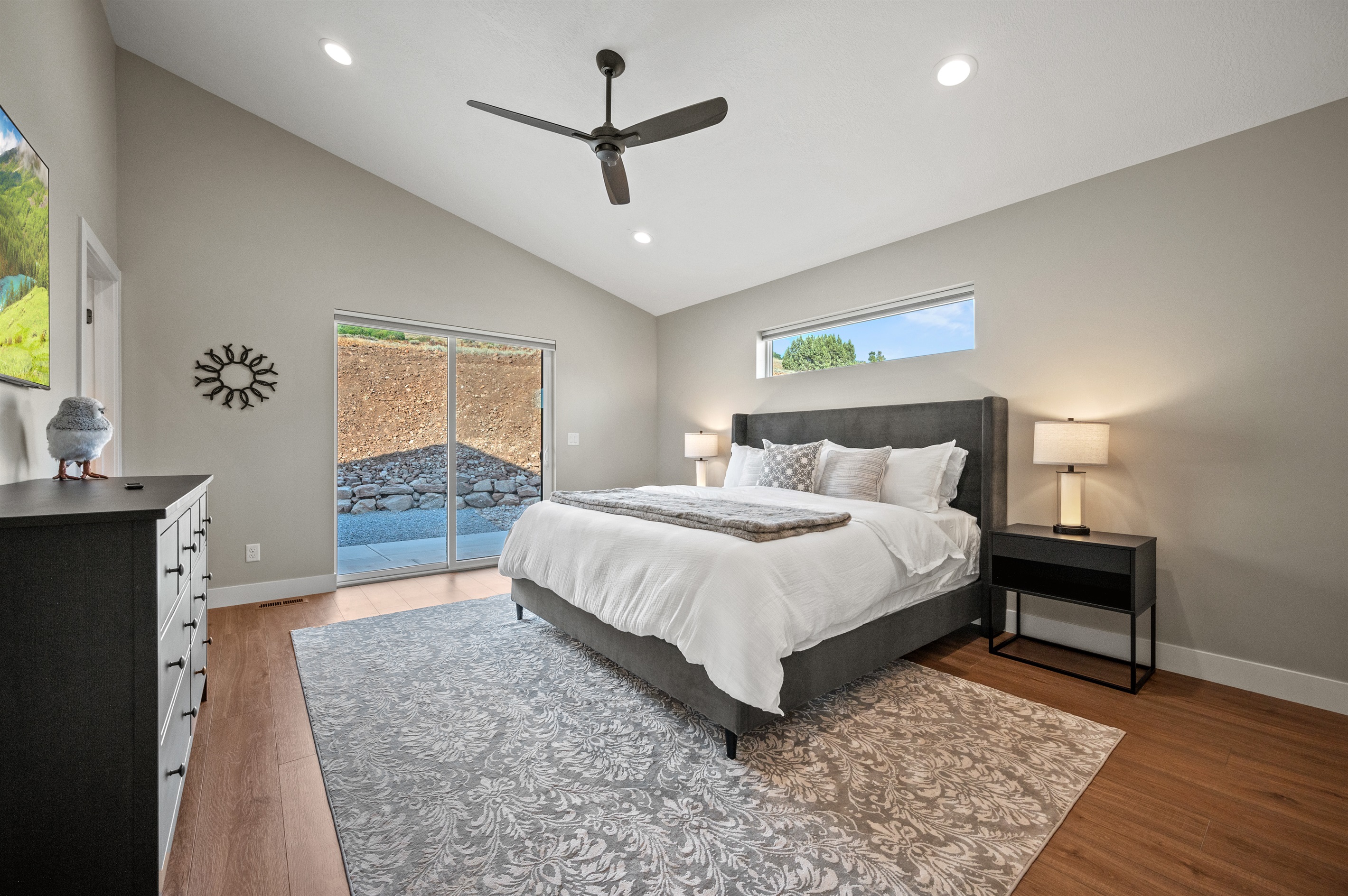 Patio doors offer direct access to fresh air, coffee at sunrise, or a relaxing evening dip in the hot tub.