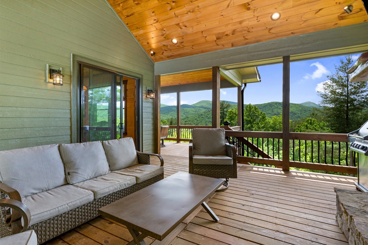 Relax in the covered lounge area, ideal for sipping morning coffee or evening cocktails.