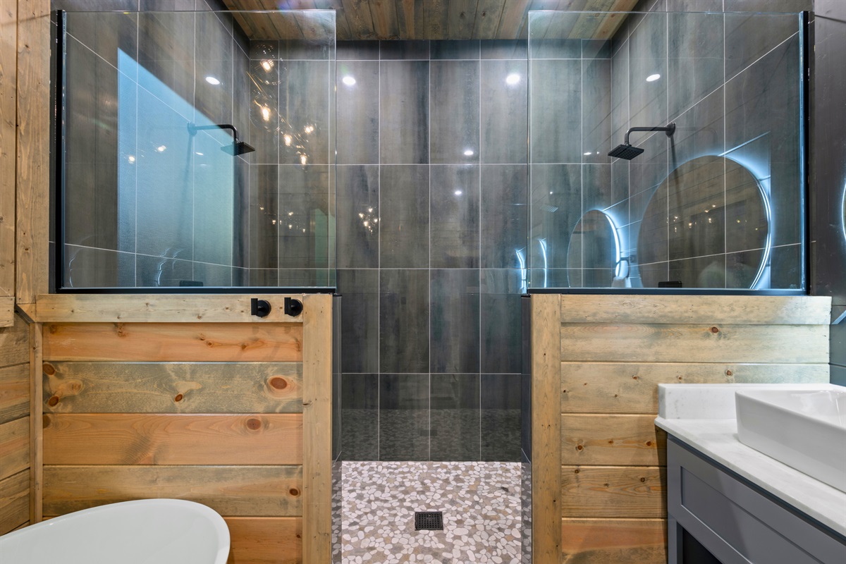 Thoughtfully designed with glass shower doors and stylish tile work, the spacious shower creates a refreshing place to start or end your day.