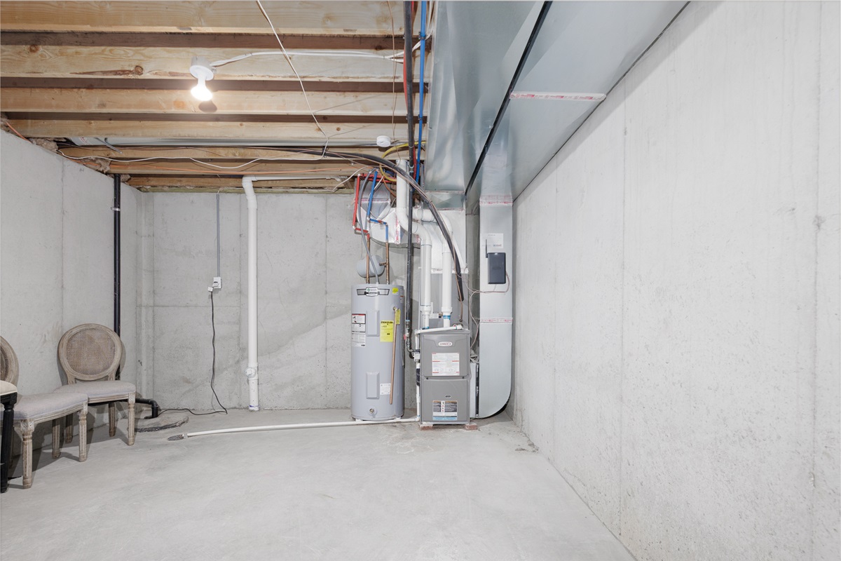 Unfinished basement suitable for storage and utility access