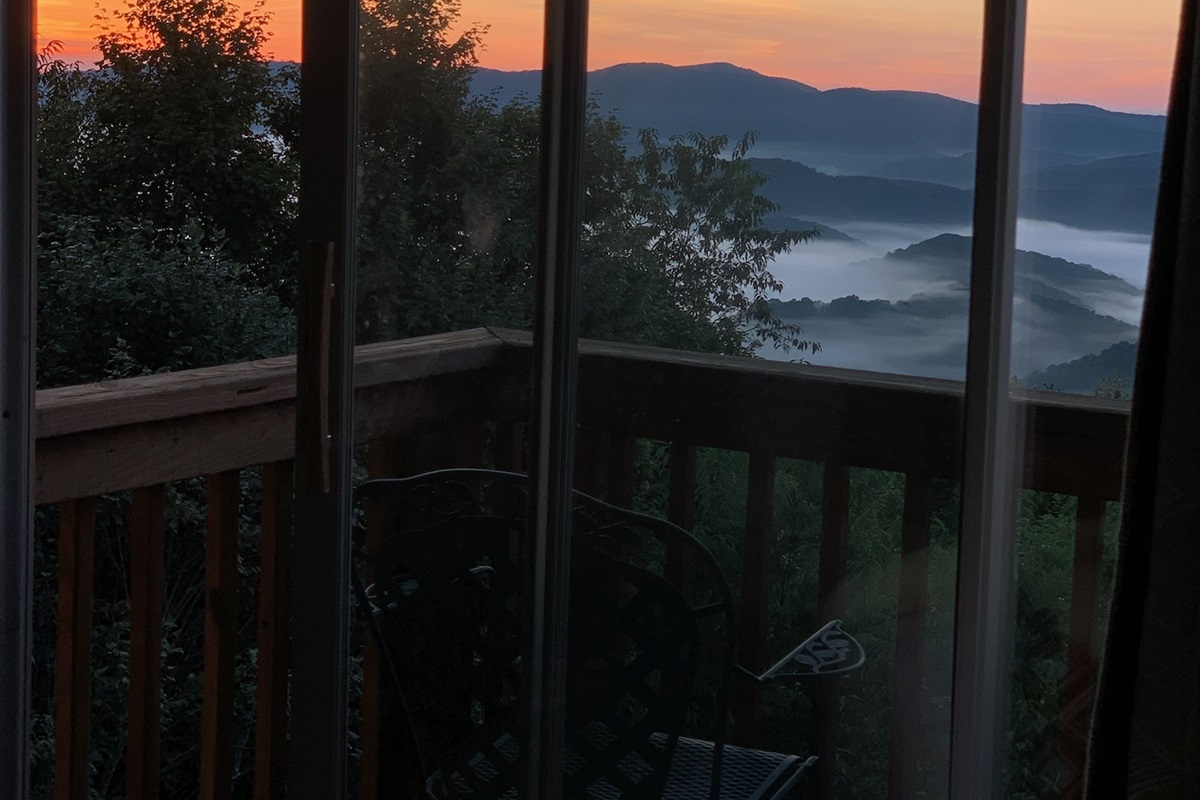 Whether you get lucky for a "cloud inversion" or "just a normal sunrise," the view from our Top Floor View Bedroom can hardly be beat. Slow mornings watching the sunrise are so peaceful! Long-range panoramic mountain & valley views