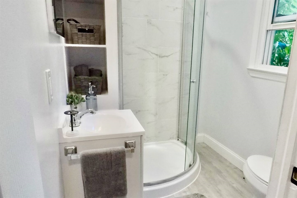 Recently 100% renovated bathroom with new everything! Shower with glass sliding door too!