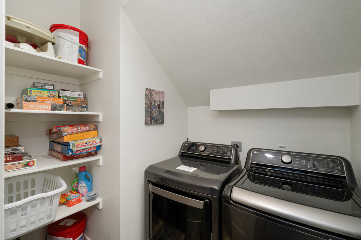 Board games and a full-size washer/dryer — because rainy mountain days call for both.