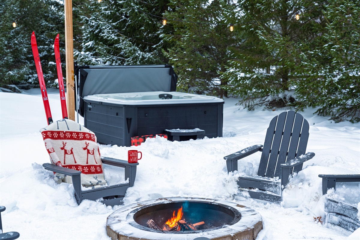 Enjoy your personal backyard playground with the firepit and hot tub. Plenty of room to play in the snow, chill by the fire and warm up in the tub. 