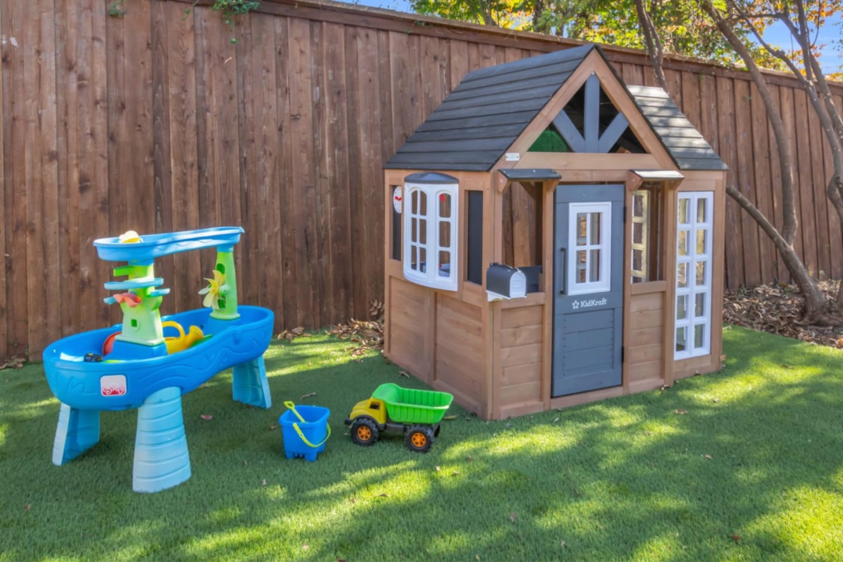 Thoughtfully designed play area with a high-quality KidKraft house and toddler-friendly water table to keep kids entertained morning to evening.