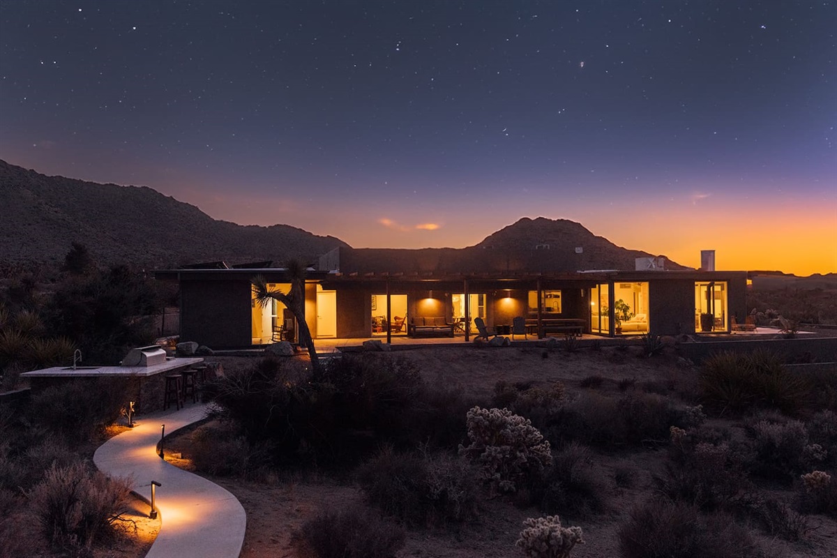 Experience magical desert nights under the stars, with cozy indoor and outdoor spaces designed for relaxation.