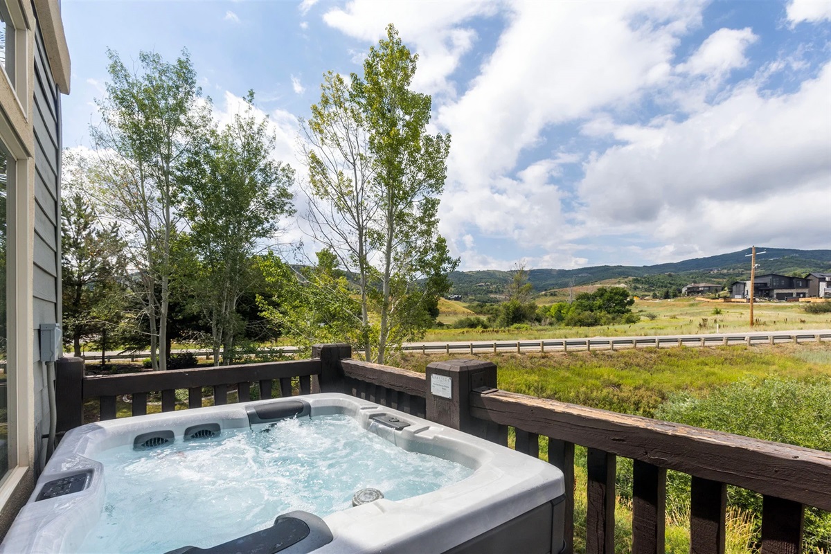 Soak under open skies and under stars in your private hot tub, surrounded by fresh mountain air and scenic views after a day exploring Huntsville—the perfect place to relax year-round.