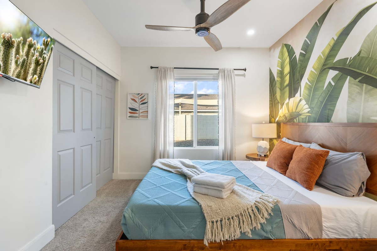 Bright guest bedroom with tropical botanical touches.