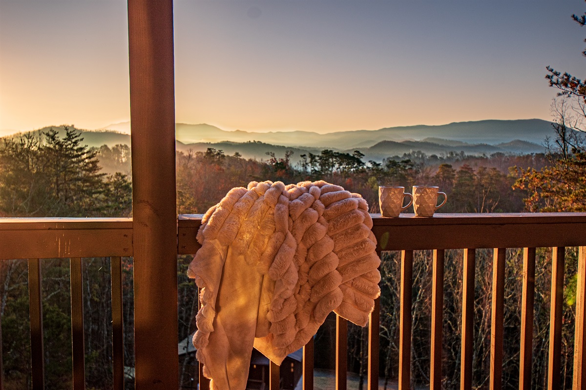 Steps from the king primary bed, walk out onto the deck surrounded by the mountains! Incredible sunrises and sunsets await.