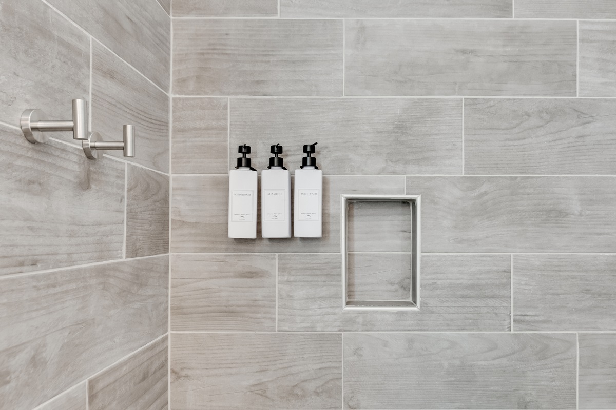 Ensuite Bathroom 2: Refresh with stylish fixtures and premium toiletries in a serene setting!