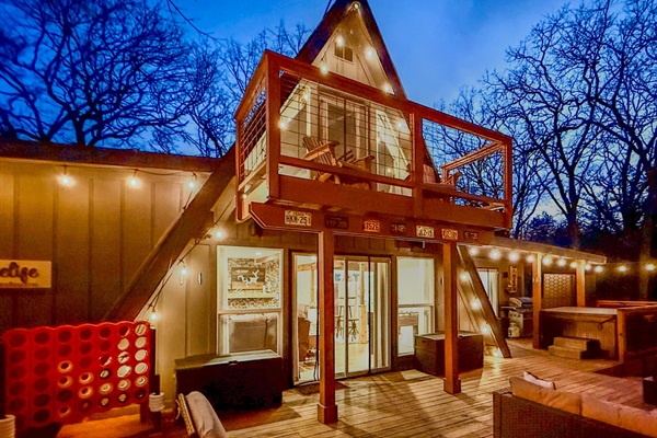 800 sf Deck | Fire Table | Outdoor Cooler | Gas Grill (Propane Provided) | Private Hot Tub | Outdoor Games | Private Wooded Views | String Lights