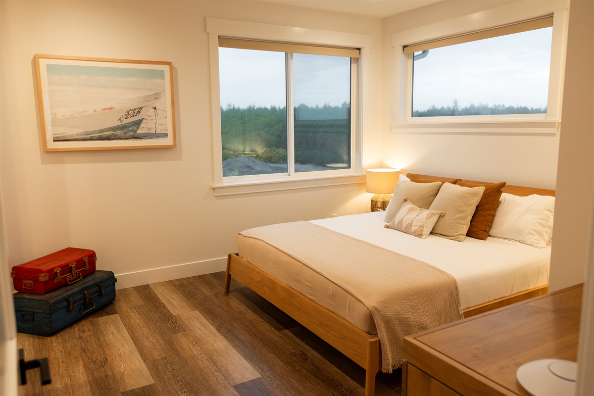 {Upstairs Bedroom} Upstairs bedroom with King bed, Ensuite bath, heated bathroom floors & shower.