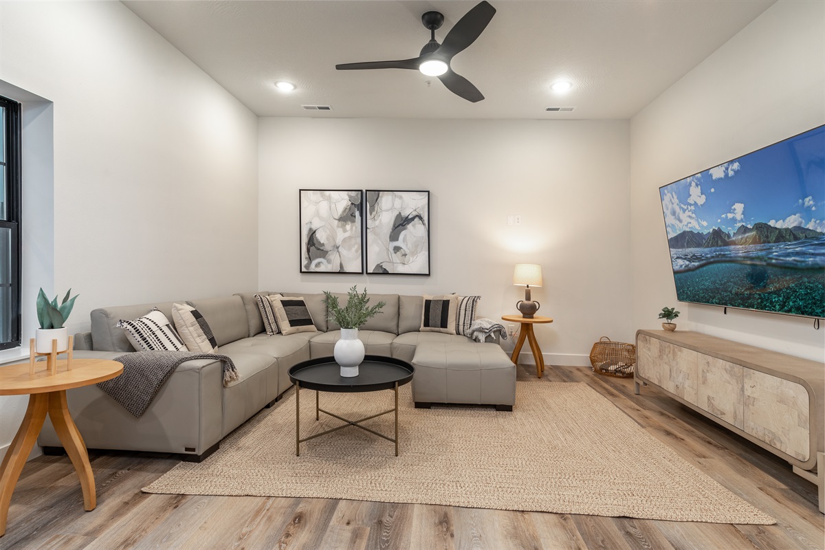 Lower level living room next to the indoor pool!