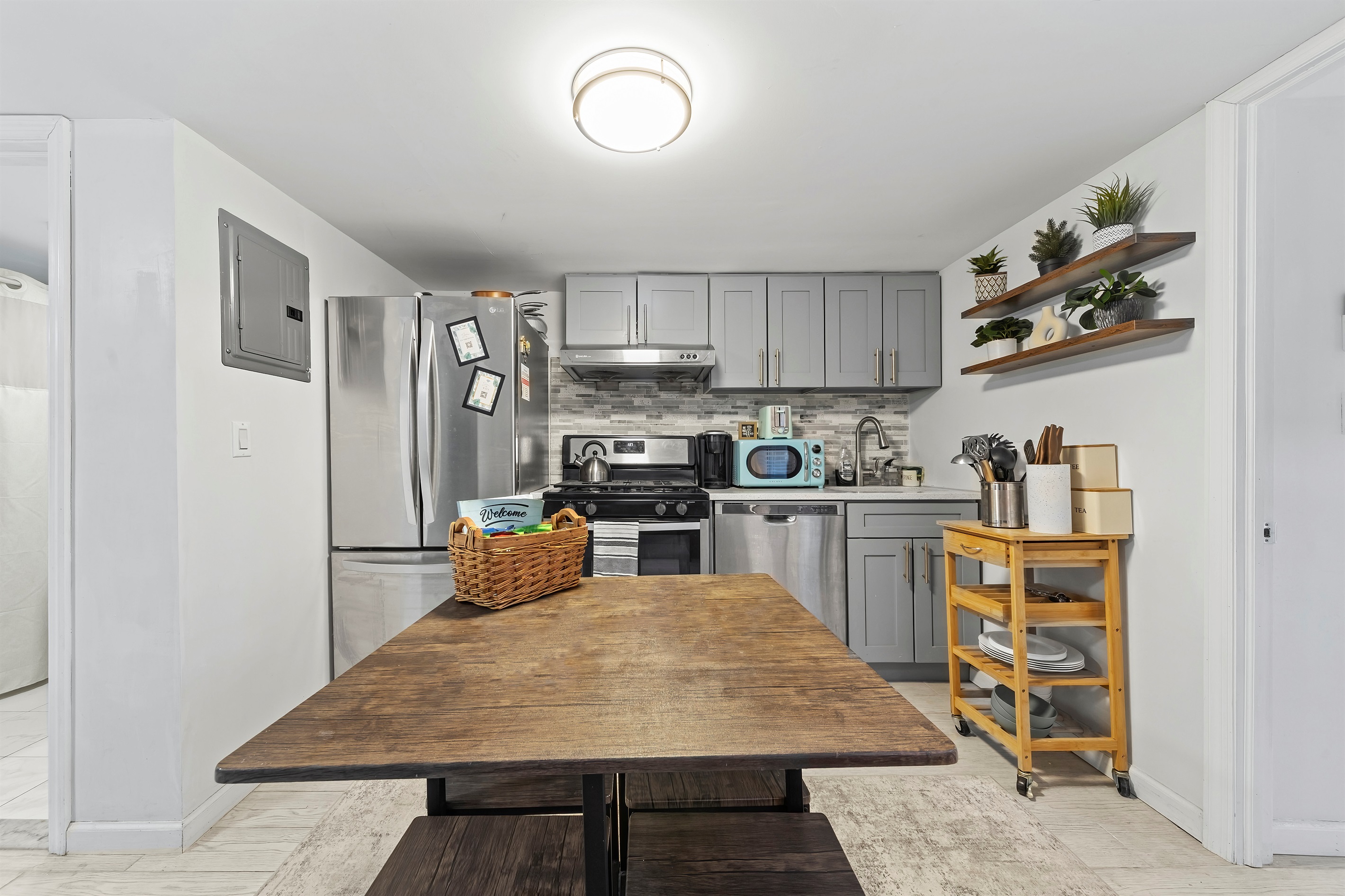 Cook with ease, share meals, and linger longer in this fully equipped kitchen designed for both quick bites and cozy dinners.