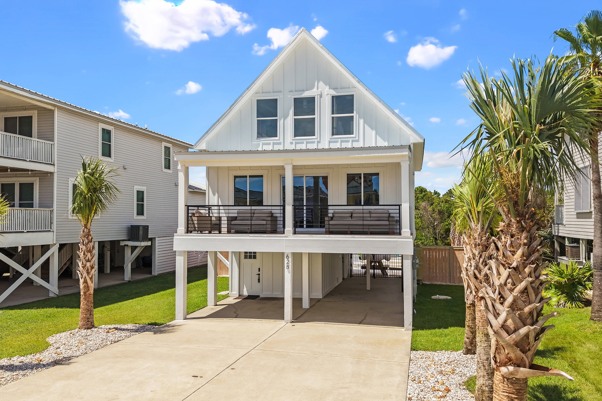 Covered parking and an easy arrival setup at the front of the home.