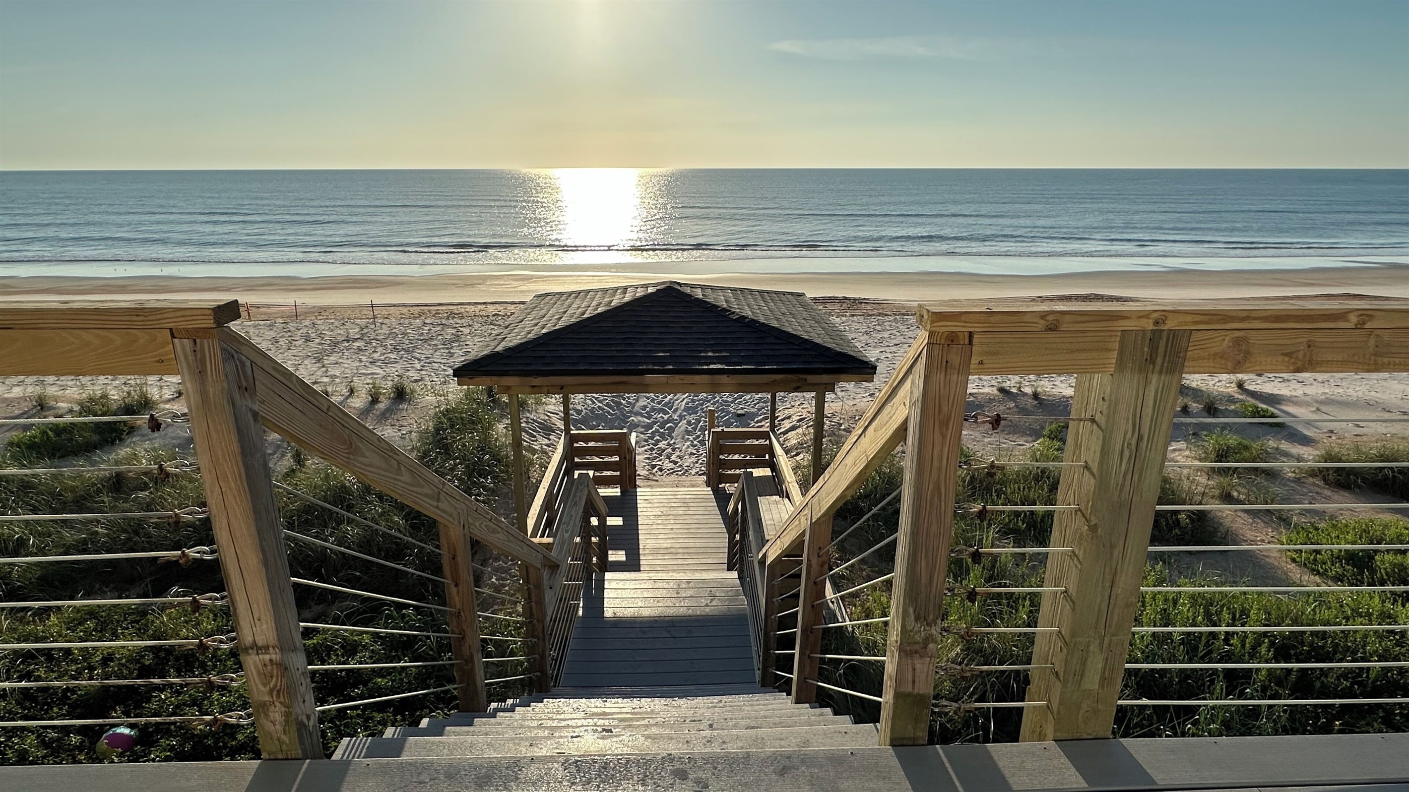 Stairs go directly from deck to the beach