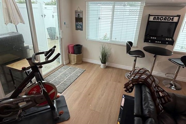Exercise Bike & Arcade - Slider to Outdoor Patio