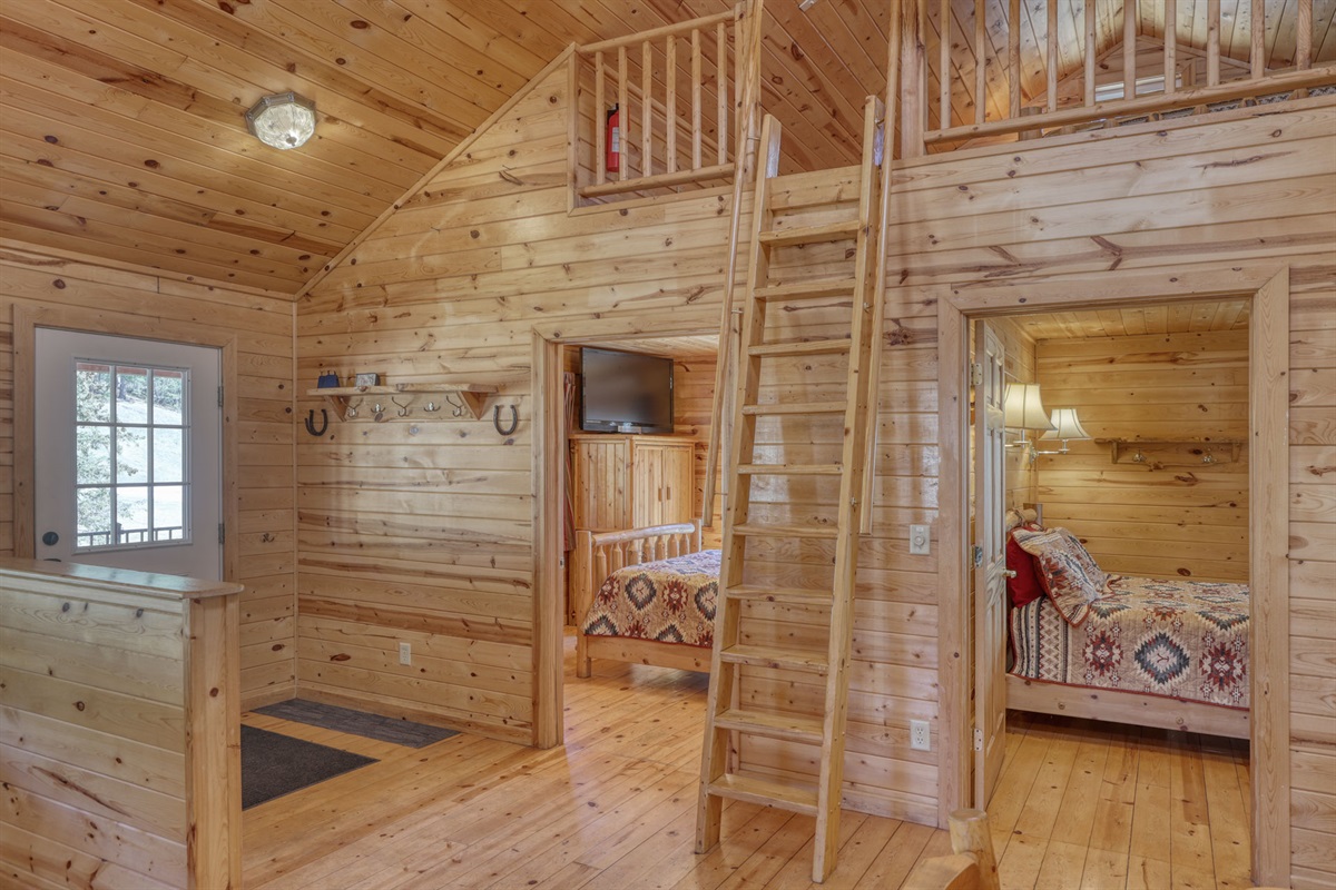 Entrance and ladder to loft